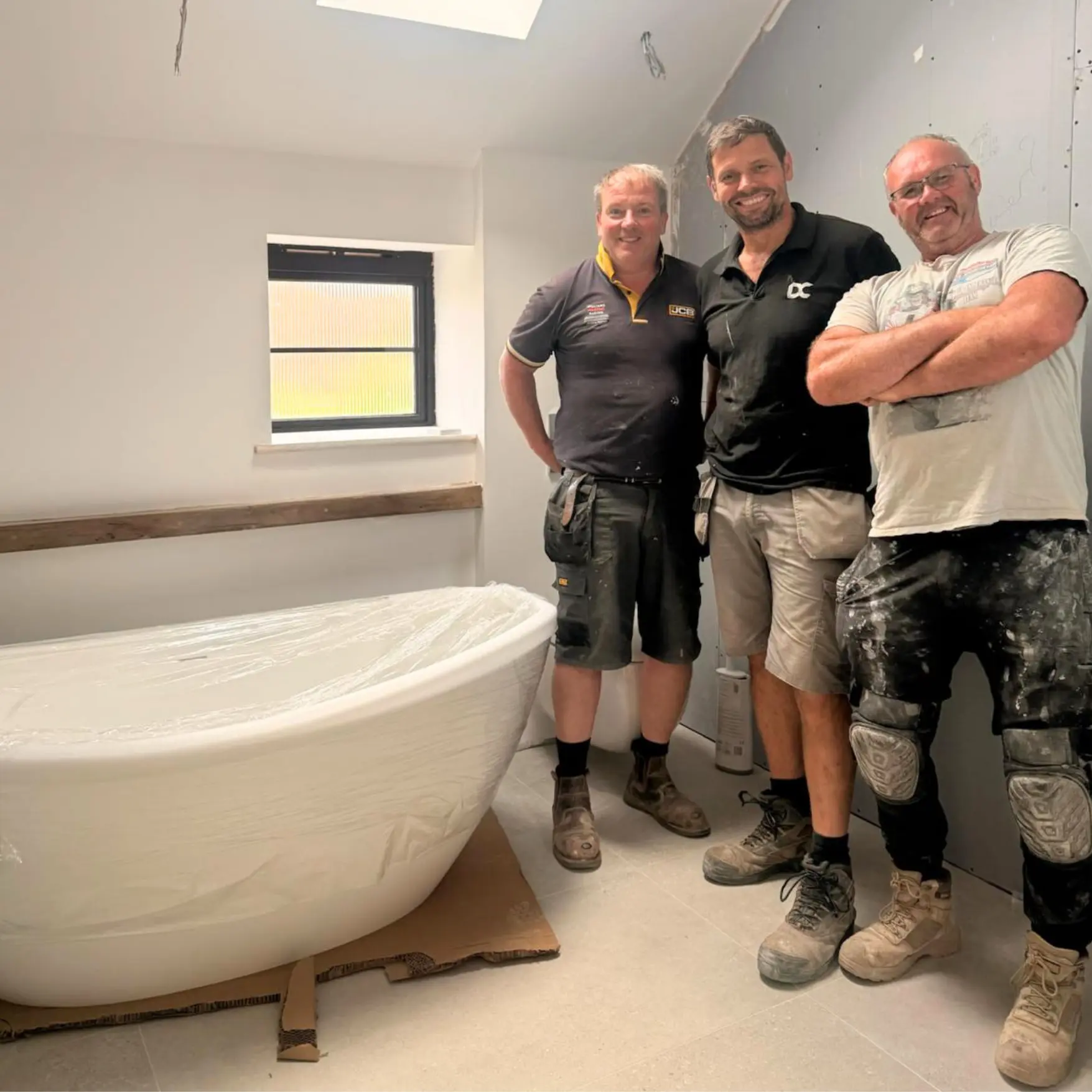 The Dixon Construction team in a finished bathroom renovation with a freestanding bath, Whiston
